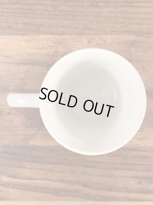 企業キャラクターのレイドバグの70年代ビンテージプラスチックマグ