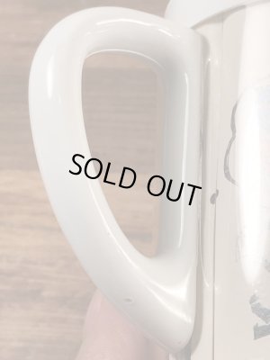 企業キャラクターのレイドバグの70年代ビンテージプラスチックマグ