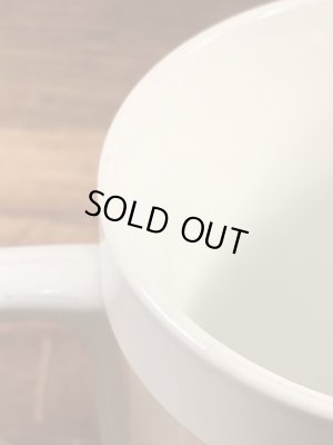 企業キャラクターのレイドバグの70年代ビンテージプラスチックマグ