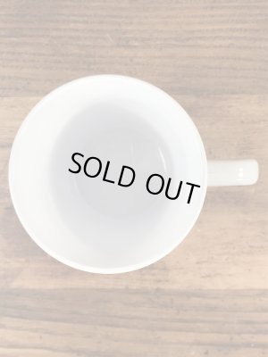 企業キャラクターのレイドバグの70年代ビンテージプラスチックマグ