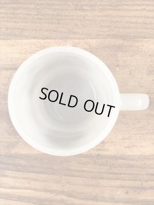 企業キャラクターのスモーキーベアのグラスベイク製のビンテージマグカップ