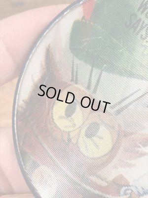 企業キャラクターのウッジーオウルの60〜70年代ビンテージレンチキュラー缶バッジ