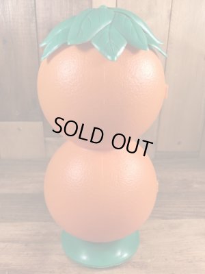 葉っぱの部分がフタになっているオレンジの60年代ビンテージジュースジャグ