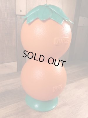 葉っぱの部分がフタになっているオレンジの60年代ビンテージジュースジャグ