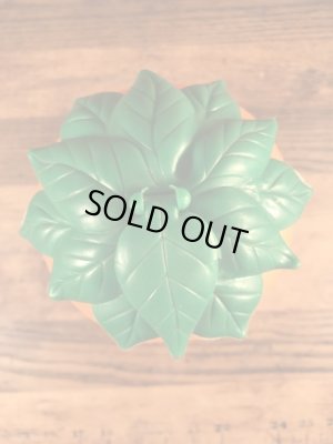 葉っぱの部分がフタになっているオレンジの60年代ビンテージジュースジャグ