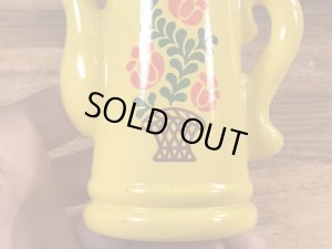 エイボン社製の花の絵が付いたポットの70年代ビンテージ容器