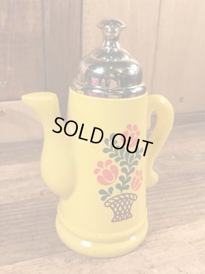 エイボン社製の花の絵が付いたポットの70年代ビンテージ容器