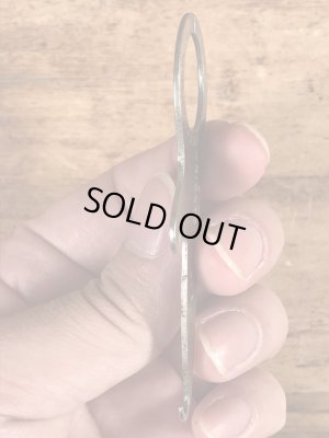 アンティークのポケットツールが付いたビンテージ栓抜き