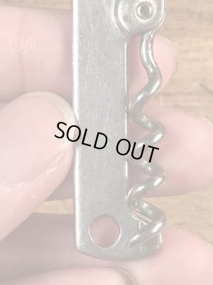 企業物の折り畳みのコークスクリューが付いたヴィンテージボトルオープナー