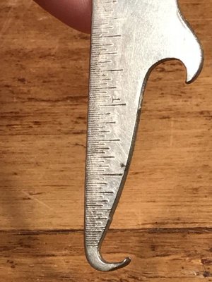 First National Bankのボタンフックが付いたヴィンテージボトルオープナー