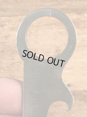 アンティークのポケットツールが付いたビンテージ栓抜き