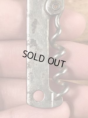 企業物の折り畳みのコークスクリューが付いたヴィンテージボトルオープナー