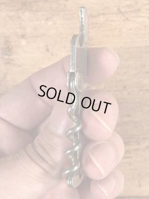 企業物の折り畳みのコークスクリューが付いたビンテージ栓抜き