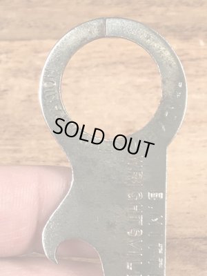 アンティークのポケットツールが付いたビンテージ栓抜き