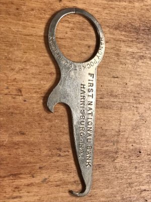 アンティークのポケットツールが付いたビンテージ栓抜き