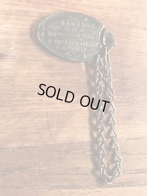 Samson Leather Tire Co.の企業物のビンテージノメタルタグ