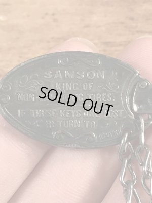Samson Leather Tire Co.の企業物のビンテージノメタルタグ