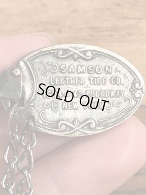 Samson Leather Tire Co.の企業物のビンテージノメタルタグ