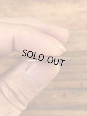 Brown Countyのブラス製のヴィンテージドッグタグ