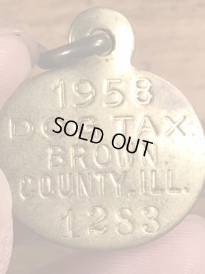 Dog Taxの真鍮製のビンテージドッグタグ