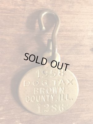 Dog Taxの真鍮製のビンテージドッグタグ