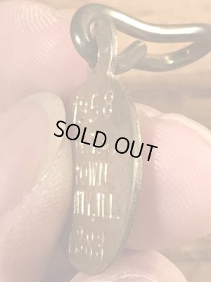 Dog Taxの真鍮製のビンテージドッグタグ