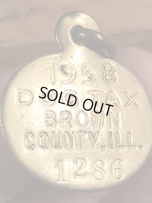 Dog Taxの真鍮製のビンテージドッグタグ