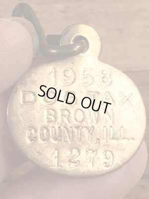 Dog Taxの真鍮製のビンテージドッグタグ