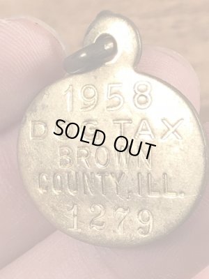 Dog Taxの真鍮製のビンテージドッグタグ