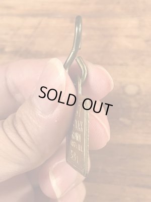 Dog Taxの真鍮製のビンテージドッグタグ