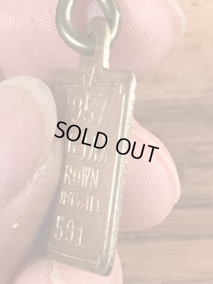 Dog Taxの真鍮製のビンテージドッグタグ