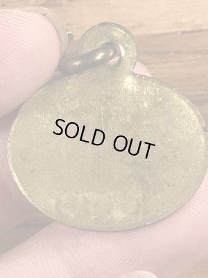 Dog Taxの真鍮製のビンテージドッグタグ