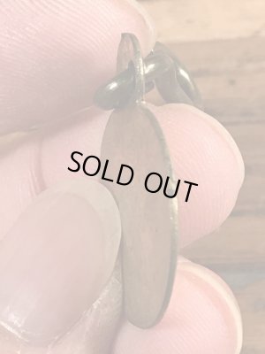 Dog Taxの真鍮製のビンテージドッグタグ