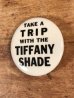 Take A Trip With The Tiffany Shadeのメッセージが書かれたヴィンテージ缶バッチ