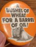 A Bushel Of Wheat For A Barrel Of Oil!のメッセージが書かれたビンテージ缶バッジ