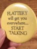 Flattery Will Get You Everywhere...Start Talkingのヴィンテージ缶バッチ
