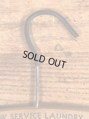 アメリカの企業物のアンティークのウッドハンガー