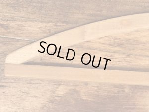 アメリカの企業物のアンティークのウッドハンガー