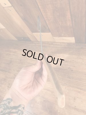 アメリカの企業物のアンティークのウッドハンガー