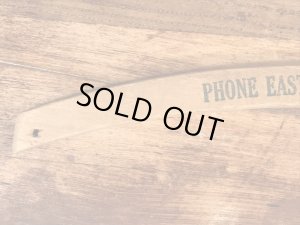 アメリカの企業物のアンティークのウッドハンガー