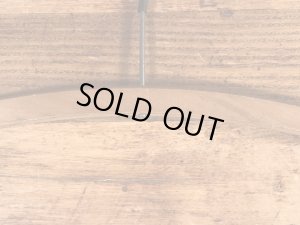 アメリカの企業物のアンティークのウッドハンガー