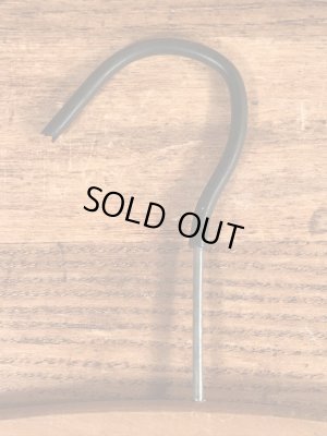 アメリカの企業物のアンティークのウッドハンガー