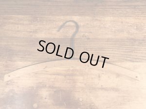 アメリカの企業物のアンティークのウッドハンガー