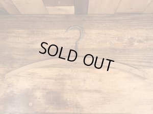 アメリカの企業物のアンティークのウッドハンガー