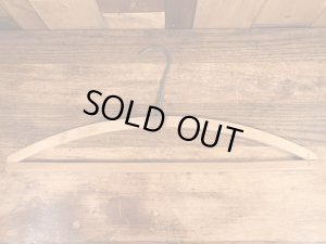 アメリカの企業物のアンティークのウッドハンガー