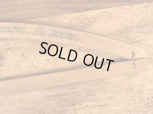 アメリカの企業物のアンティークのウッドハンガー