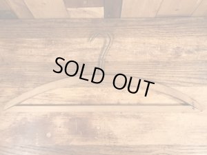 アメリカのアドバタイジング物のアンティークのウッドハンガー