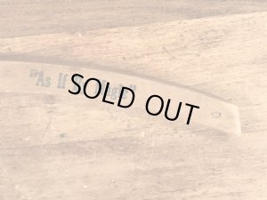 アメリカの企業物のアンティークのウッドハンガー