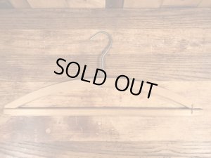 アメリカのアドバタイジング物のアンティークのウッドハンガー