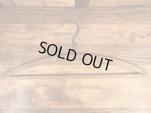 アメリカのアドバタイジング物のアンティークのウッドハンガー